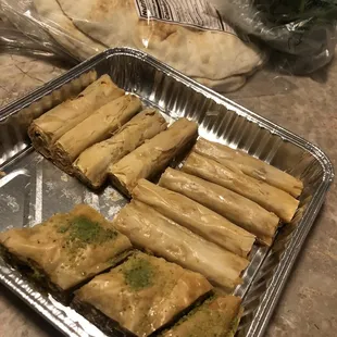 Baklava, pita, and fresh produce.