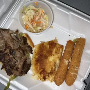 1/2 portion cheese steak with cheese sticks and coleslaw
