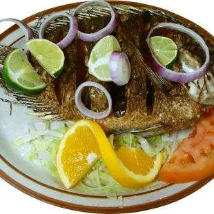 a whole fish on a plate