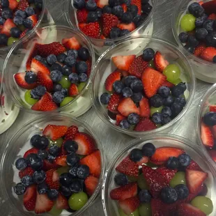 The "Tropical Rush" Honey Greek Yogurt with fresh fruit and our homemade granola