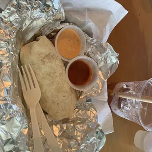 Breakfast wrap. Get the orange sauce!