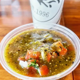 a close up of a bowl of salsa