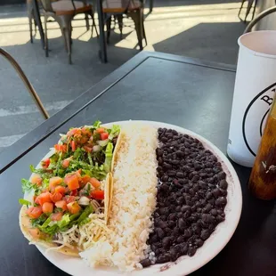 2 carne asada tacos, rice and black beans- patio seating of course.