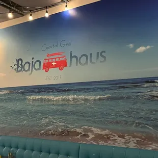 a bus on the wall of a restaurant
