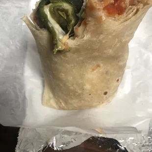 chile relleno burrito. One of the best burritos I've ever had. Sorry for the bad pic, but I forgot to cut into it before hand. ‍
