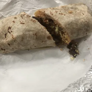 Carne asada burrito with everything. Delicious and filling.