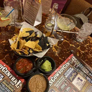 Complementary Chips come with three different dips. Salsa bean and guacamole