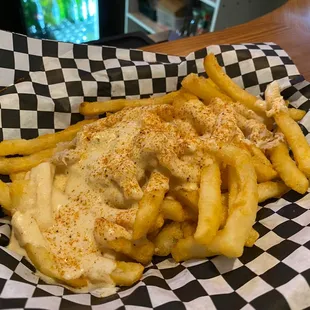 She Fries Basket of our crispy fries smothered in our house made she crab soup and finished with Old Bay