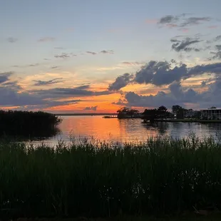 a sunset over a body of water