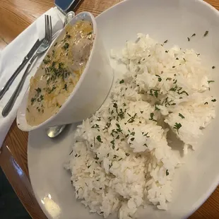 Seafood gratin with she sauce.