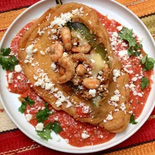 &quot;Eat the Street&apos; Cheese theme dish. A HUGE Poblano chile stuffed with cheese and shrimp, then coated in an egg batter and salsa