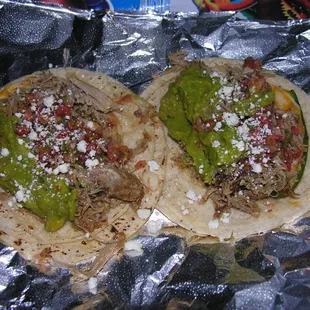 Carnitas tacos w/ cheese stuffed fire roasted jalapenos and guacamole