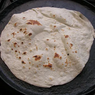Nothing beats a FRESH handmade flour tortilla!  The smell and texture is unbelievable!  This one is ready to roll.
