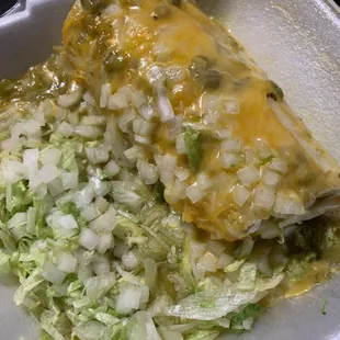 Shredded beef burrito smothered with green chilis
