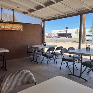 tables and chairs outside a restaurant