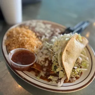 6. Taco Enchilada Combo with refried beans and Side of Spanish Rice