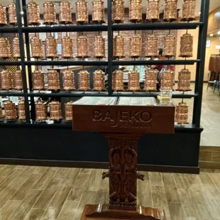 a display of copper pans