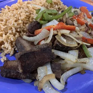 Steak fajitas with Mexican rice.