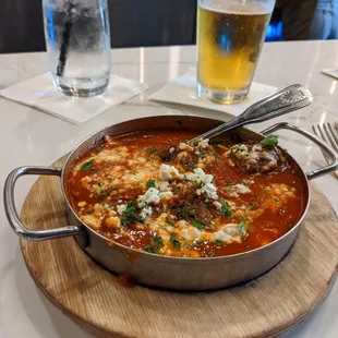 Keftedakia. Meatballs, tomato sauce and feta.