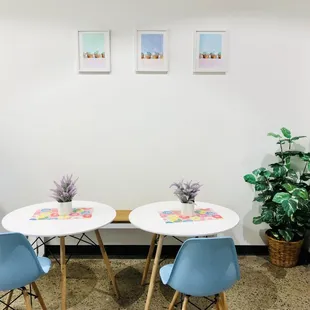 two chairs and a table in an office