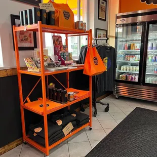 an orange shelf in a store