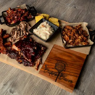 Pork Board
 
 Braised pork belly, bacon burnt ends, pulled  pork, pork shoulder, bacon jam, millionaire bacon, &amp; a half rack of ribs