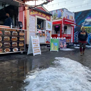 a food truck parked in front of a building