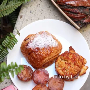 Valrhona Chocolate Croissant ($5), Cheesy Garlic Pull-Apart ($5), All Four Mochi Bites ($6), Black Sesame Babka ($25)