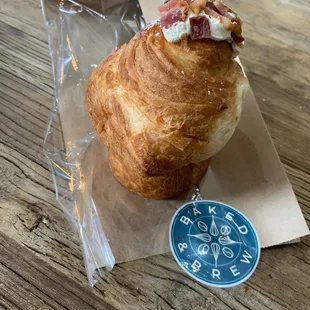 A cruffin is a croissant &amp; muffin. This one had a bacon topping &amp; a surprising amount of delicious whipped cream inside. Yes I ate it all!!