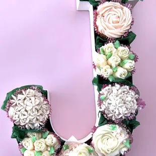 the letter j made of cupcakes