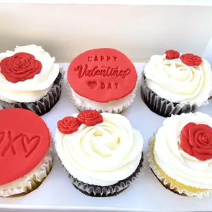 a dozen cupcakes in a box