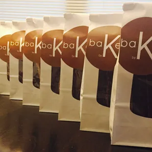 a row of bags of baked goods