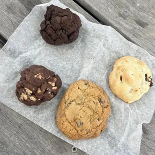 Dutch chocolate peanut butter, old fashioned chocolate chip, white chocolate sour cherry, dark chocolate sour cherry