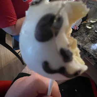 Half eaten panda cake pop