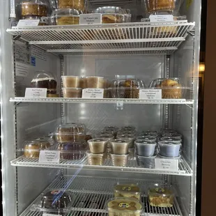 a refrigerator full of baked goods