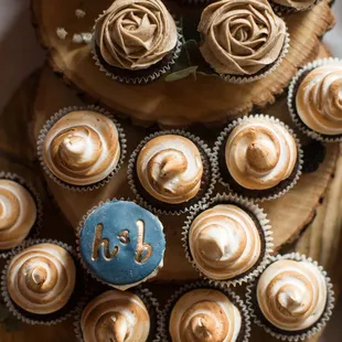 Signature s&apos;mores and espresso cupcakes with custom fondant topper.