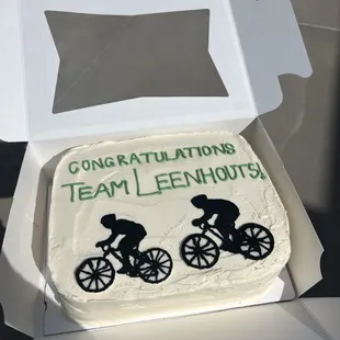 Custom celebration cake with buttercream bicycles