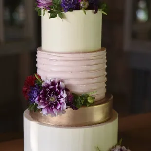 Our gorgeous wedding cake. Tiers of coconut blackberry and lavender lemon.