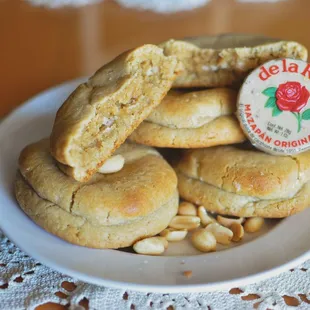 a plate of cookies with a rose label