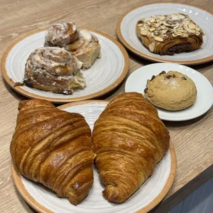 a variety of pastries on plates