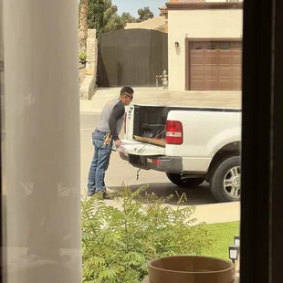 Baker Glass delivering my glass tabletop!