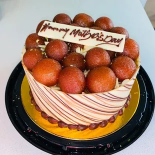 a cake with a happy mother's day sign