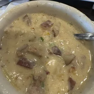 Potato soup with bacon, cheese and green onion