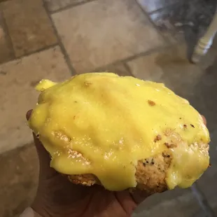 Lemon scone doused in thick crust of sugar glaze, over the top sweet.