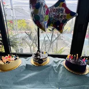 Mango cake, chocolate cake, and ube Yema cake