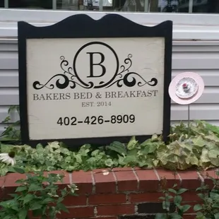 Pretty sign and landscaping.