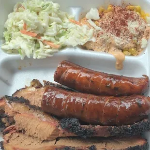 a tray of meat and coleslaw
