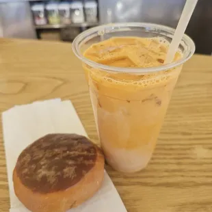 Thai tea with Bavarian creme donut