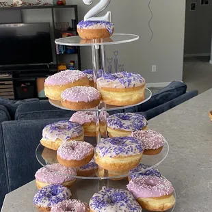 Special order purple frosting and purple sprinkle donuts.