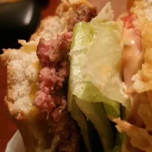 I was served a raw looking pattie and I had to remove half of the lettuce the  Its awful. I'm scared to eat my burger.